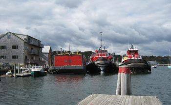 Views from Belfast Harbor of CoastWise Realty Office and Maine Tugboats