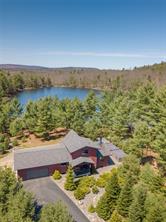 Maine Contemporary Home on a private pond in a gated community for sale in Swanville, Maine