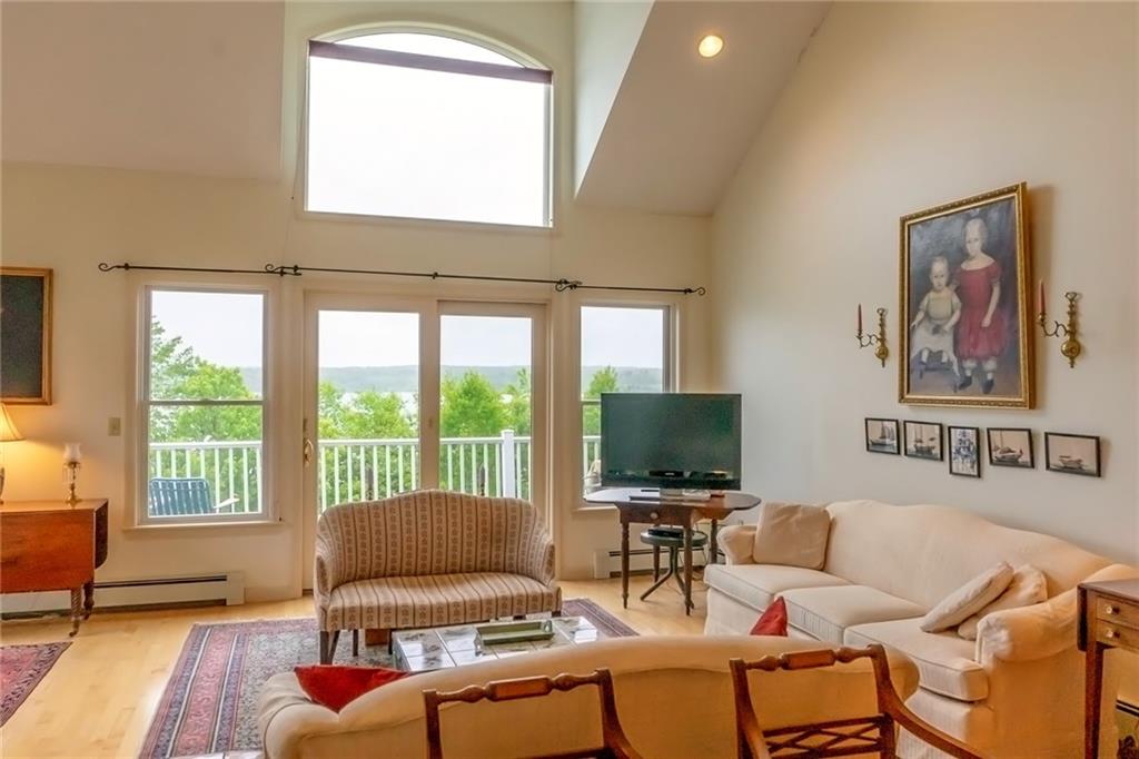 Livingroom end-unit townhouse at the ocean's edge with big views of beautiful Stockton Harbor