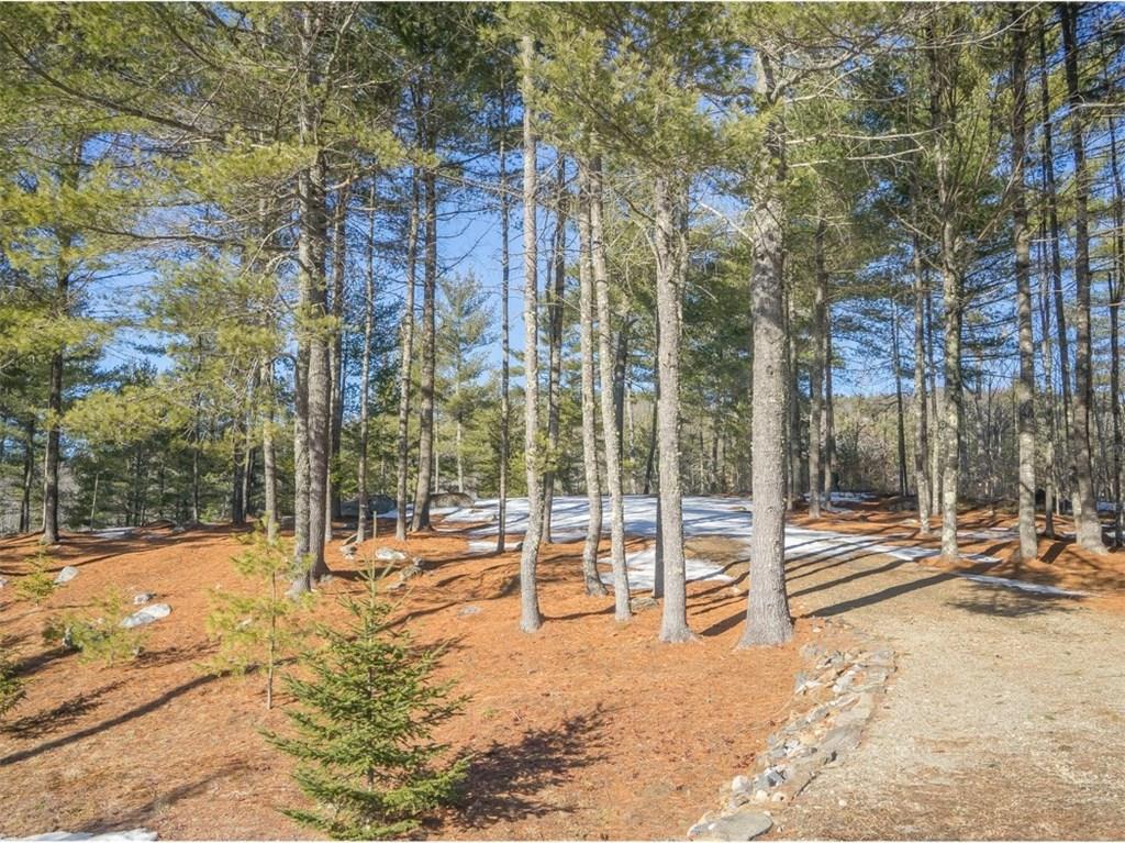 Maine buildable lot - 1.01 acres with 215 feet of waterfront for sale on private pond