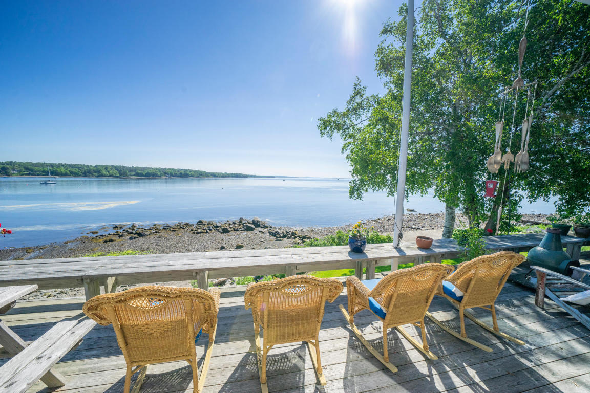 Maine home for sale sited at the water's edge on a beautifully