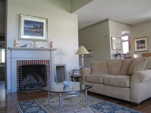 Real Estate Listing - Belfast, Maine - Gracious and care-free one-level living - Maine waterfront Condo end unit in oceanfront community with deepwater dock and float