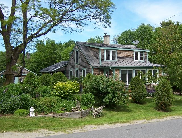 Maine Real Estate Listing - babbling brook and a three-bedroom home in move-in condition